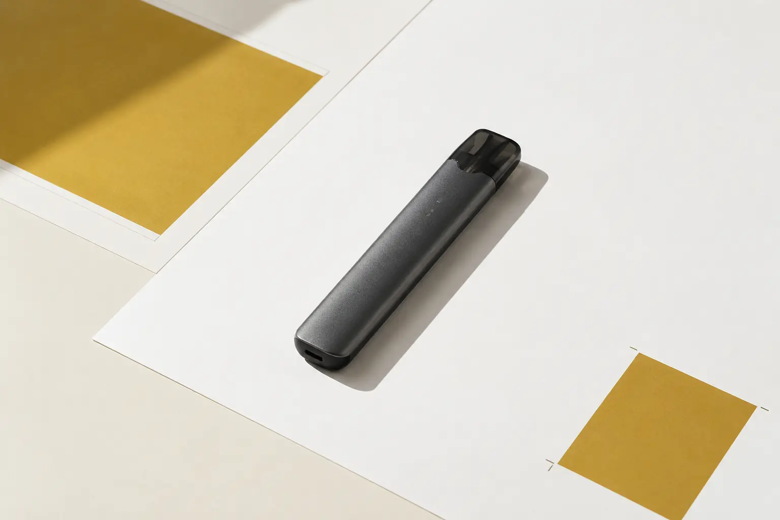 A precision pod device arranged on a white studio desk